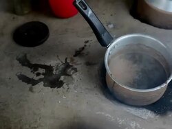 Tea being prepared on a road side restaurant in India Stock Footage