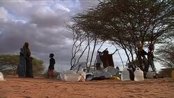 Family builds makeshift tent at camp filled with drought refugees Instructional Video