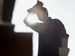 Man hammering outside Stock Footage