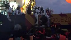 Migrants rescued from Mediterranean by MOAS - night rescue News Clip