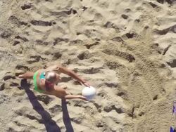 HD Super Slo-Mo:Shot of Young Women Playing Beach Volley Stock Footage