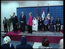 WRAP Clinton in surprise visit ADDS excerpts of embassy speech News Clip