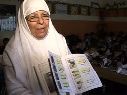 VOICED: Iraqi textbooks cuts along sectarian divide News Clip