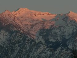 WS View of evening sun reflecting on snow capped mountain in Wasatch Range / Utah, United States Stock Footage