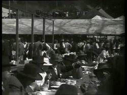 B/W PAN of Civil War veterans eating at tables at reunion / Vicksburg, Mississippi / NO SOUND Stock Footage