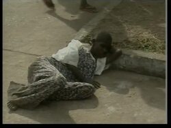 Displaced in stadium as locals hope for intl force News Clip