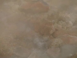 CU Boiling water and steam rising from ground in Krysuvik Geothermal area / Reykjanes peninsula, Iceland      Stock Footage