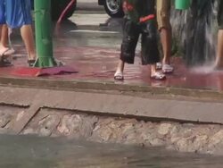 CU, Thailand, Chiang Mai, Songkran Water Festival, People dipping buckets into water, low section Stock Footage