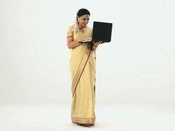 South Indian woman working on a laptop  Stock Footage