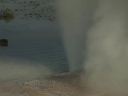 Medium static - A geyser erupts in Wyoming. / Wyoming, USA Stock Footage