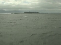 Aerial of lighthouse on an island in Norway. Stock Footage