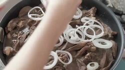cooking chicken liver with onions Stock Footage