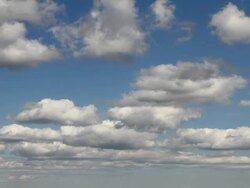 white clouds in a blue sky Stock Footage