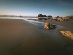 WS ZI Boy running on beach / Bandon, Oregon, United States Stock Footage