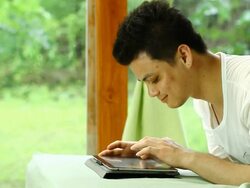 Young Adults with Tablet screen and smile Stock Footage