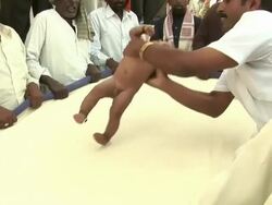 Bizzare Baby Throwing Festival In India Stock Footage