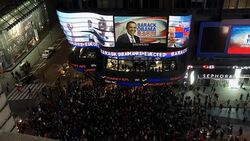 Times Square electronic hoarding Obama re-elected News Clip