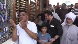 CLEAN : Pilgrims flock to Baghdad shrine for Shiite commemoration (2) News Clip