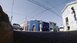 Young adult male rollerblade in urban street Stock Footage