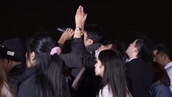 Patient skywatchers wait for clouds to clear for view of lunar eclipse News Clip
