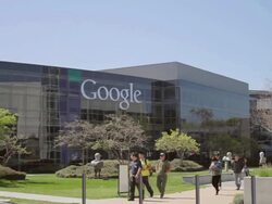MS TD Pedestrians walking in front of headquarter's campus with building logo / Mountain View, California, United States Stock Footage