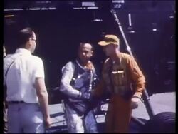 Astronaut Alan Shepard getting off helicopter after splashdown Stock Footage