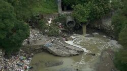 Sewage draining into polluted water collection pond in Mexico City. Stock Footage