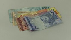 CLEAN : Brazilian real hits all time low against dollar reactions News Clip