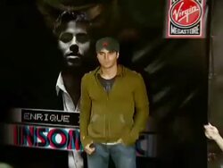 Enrique Iglesias Promotes Release of 'Insomniac' with Performance and Signing Stock Footage
