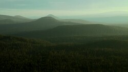 Buttes and peaks covered with evergreen forest in Lassen National Forest. Stock Footage