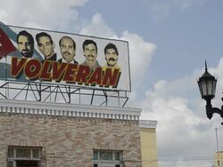 Poster of five Cuban heros in center of town of Cienfuegos Cuba Stock Footage