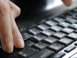 Girl Typing at Keyboard Stock Footage
