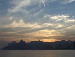 T/L, WS, Brazil, Rio de Janeiro, Moody sky above Pedra da Gavea Rock at sunset Stock Footage