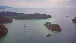 Fishing boats moored by their village in the Burmese archipelago Stock Footage