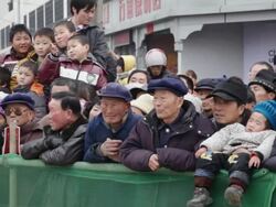 MS PAN Crowd of onlookers in traditional festive folk celebration or carnival during chinese spring festival / xi'an, shaanxi, china Stock Footage