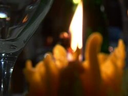 Candle and a glass Stock Footage