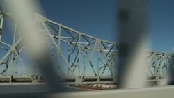 Angular struts support a bridge that spans the Mississippi River. Stock Footage