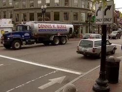 MS Bikers, pedestrians and vehicles traveling  through Harvard square with families AUDIO / Cambridge, Massachusettes, United States Stock Footage