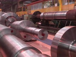 MS Man walking in bending roller during processing hall / Volklingen, Saarland, Germany Stock Footage