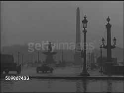 1930s: PARIS, FRANCE: Street scenes; WS Traffic moving on street by Place de la Concorde w/ fountain & Oblisque de Luxor (obelisk) BG. LS (looking SE) Oblisque de Luxor in Place de la Concorde at end of Avenue des Champs Elysees. Iconic, pre-war Instructional Video