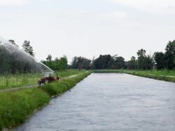 tractor watering plants Stock Footage