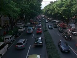 WA Sunday afternoon city traffic, busy roads on omote sando street, Tokyo, Japan Stock Footage