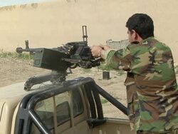 MS Soldier holding gun and shooting / Mausa Qala, Helmand Province, Afghanistan. Stock Footage