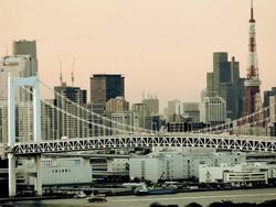 Rainbow Bridge and Tokyo Bay, with the Tokyo Tower in view, Odaiba district, Tokyo, Japan, Asia Stock Footage