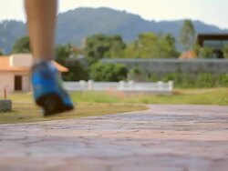 Woman jogging in park Stock Footage