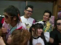 MS PAN Shot of group of young trendily dressing people in small restaurant, eating, laughing and having fun / Tokyo, Japan Stock Footage