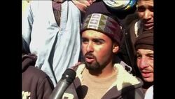 CLEAN: Egyptians crowd Libyan border to flee uprising News Clip