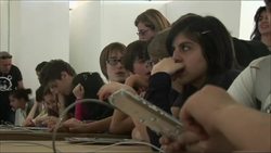 E-readers and paper books battle it out News Clip