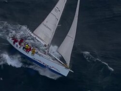 Brokenwood cutting through stormy sea: the 54ft yacht sailed by Sailors with Disabilities in the 2009 Sydney to Hobart Yacht Race. Skippered by David Pescud, Australia Stock Footage