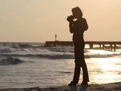 Asian woman taking photograph. Stock Footage